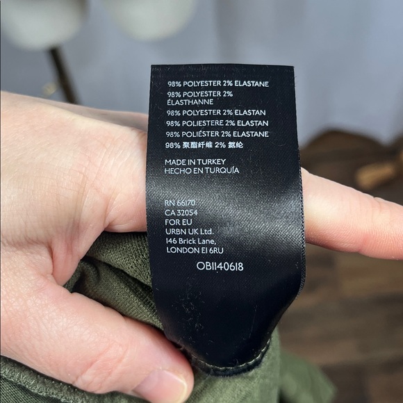 Free People Lily Violet Mini Dress in Olive Smoke. - Picture 10 of 11